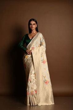 Featuring intricate Meenakari work, this handloom satin silk saree is perfect for special occasions, offering timeless elegance in a classic white hue. Satin Silk Saree, Silk Banarasi Saree, Banarasi Silk Saree, Banarasi Saree, Satin Silk, Banarasi Sarees, White Satin, Classic White, Silk Satin