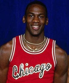 a man in a chicago basketball uniform posing for a photo