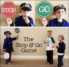 two boys in uniforms holding up stop and go signs