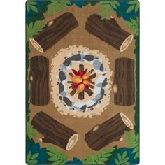 a rug with wood logs and a flower in the center