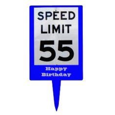 a blue speed limit sign sitting on top of a white wall with the words happy birthday written below it