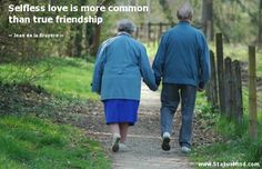 an older couple walking down a path holding hands and saying what do you think?