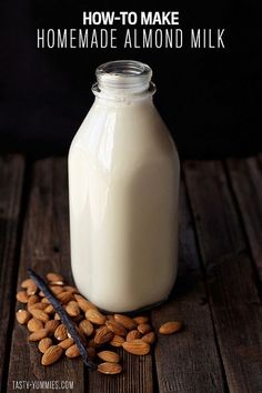 a glass bottle filled with milk and nuts