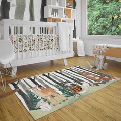 a baby's room is decorated in white and green colors with deers on the rug