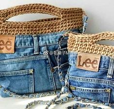 two purses made out of old jeans with the words lee written on one side