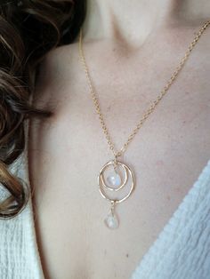 Beautiful Moonstone Pendant Necklace in your choice of Sterling Silver or 14k Gold Filled. This beauty is so versatile and can be worn with a casual t-shirt to a bridal gown! The circles are hammered for texture and shape. The pendant length is about 1 1/4 in.Each piece is handmade and may vary as well as the stones as they are natural. Some of the moonstone will be more white, see through, and some will have more rainbow in them than others. If you have a preference, feel free sending me a mess Moonstone Necklace Silver, Moonstone Pendant Necklace, Necklace Ideas, Moonstone Necklace, Moonstone Pendant, Casual T Shirt, Moon Stone, Bridal Gown, Stone Necklace