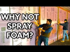 two men working on a wall with the words why not spray foam? in front of them