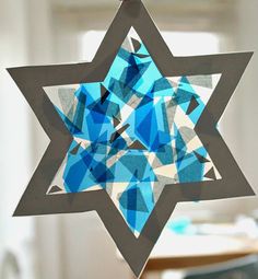 the star suncather with printable template is hanging in front of a window