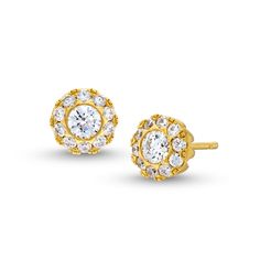 Perfect for any occasion, these diamond frame stud earrings are a stunning addition to your jewelry box. 14K gold Each post earring showcases a 1/5 ct. round diamond center stone Smaller diamonds line the halo frame 3/4 ct. t.w. of diamonds Friction backs Elegant Yellow Gold Earrings With Halo Setting, Timeless Gold Halo Earrings, Yellow Gold Halo Design Earrings For Anniversary, Elegant Gold Diamond Earrings With Halo Setting, Gold Halo Cluster Earrings For Formal Occasions, Gold Halo Cluster Earrings For Formal Events, Gold Cluster Earrings With Halo For Formal Occasions, Formal Gold Cluster Earrings With Halo, 14k Gold Halo Diamond Earrings For Formal Events