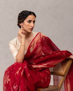 River of lights.  A special edition of Tilfi's 'Reflections' saree, this rust-red pure cotton Jamdani has been handwoven with Real Zari in a pattern evocative of a thousand burning lamps scintillating on the sacred waters of the Ganges.  #Tilfi #Jamdani #RealZariSaree #RaktambariSaree #BanarasiSaree #SRCJDMR10668 Saree Ideas, Saree Styles