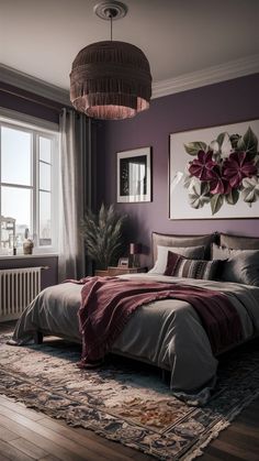 a bedroom with purple walls and a large bed in front of a window that has a painting on the wall