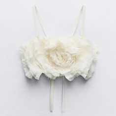 New With Tag Zara S/S 2024 Collection Straight Neck Crop Top With Straps. Textured Self-Flower Detail With Bow At Front. Back Tie Closure. Oyster-White 7200/008 Outer Shell 100% Polyester Lining 100% Polyester Which Has At Least: Outer Shell 100% Rcs-Certified Recycled Polyester Clothing Care Guide: Hand Wash Max 30c/86f Do Not Use Bleach / Whitener Do Not Iron Do Not Dry Clean Do Not Tumble Dry Chic Off-white Tops For Wedding, Chic Off White Tops For Wedding, Chic Off-white Wedding Tops, Cream Summer Wedding Top, White Summer Wedding Top, White Spring Wedding Top, White Wedding Top For Spring, White Zara Top For Wedding, Oyster White