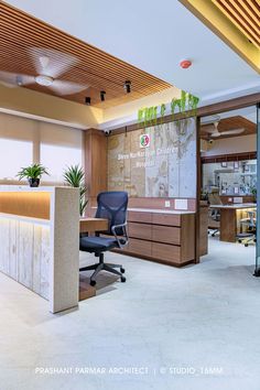 an office with wooden paneling and glass walls