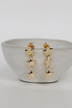 Gold Star Drop Earrings Star Charm Earrings For Party, Dangle Earrings With Star Charm For Party, Party Drop Earrings With Star Charm, Dainty Yellow Gold Earrings With Star Charm, Yellow Gold Drop Earrings With Star Charm, Black Dress Heels, Dainty Yellow Gold Star Charm Earrings, Gold Star-shaped Earrings For Party, Gold Star-shaped Tarnish Resistant Earrings