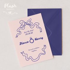 a wedding card with a blue ribbon on the front and purple envelope, which has an image of a diamond ring