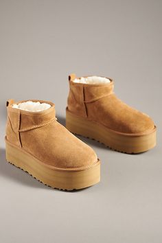 * Sheepskin upper, insole* Rubber sole* Pull-on styling* Imported Waterproof Uggs, Ugg Ultra Mini, Ugg Bailey Button, Ugg Classic Ultra Mini, Honey Color, Ugg Classic Mini, Brown Fits, Outfit Inspiration Fall, Ugg Classic