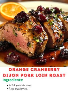 an ad for orange cranberry dijon pork loin roast on a plate