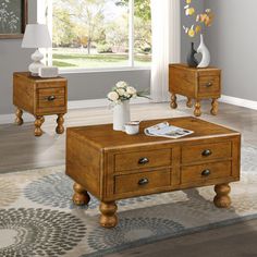 a living room scene with focus on the coffee table and two end tables that have drawers