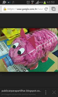 a pink paper mache shaped like a pig