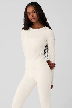 Ribbed Sea Coast Long Sleeve - Ivory | Alo Yoga White Stretch Alo Yoga Top, Fitted White Alo Yoga Top, Alo Yoga White Stretch Top, Alo Yoga Stretch Tops For Loungewear, Everyday Ribbed Cream Tops, Everyday Cream Ribbed Top, White Long Sleeve Alo Yoga Top, Alo Yoga White Long Sleeve Tops, Alo Yoga Long Sleeve Top