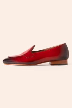 Ombre cherry leather slip on loafers with stitch line detail.
Composition: Leather
Color: Red
Other Details: 
Weight: 2 kgs
Heel height: 0.75 inches
 - Aza Fashions Classic Slip-on Loafers With Red Sole, Classic Wingtip Loafers With Red Sole, Red Semi-formal Loafers With Round Toe, Red Round Toe Loafers For Semi-formal Occasions, Formal Slip-on Moccasins With Red Sole, Classic Loafers With Red Sole For Business, Classic Business Loafers With Red Sole, Classic Red Tassel Loafers For Business, Classic Red Tassel Loafers With Rubber Sole