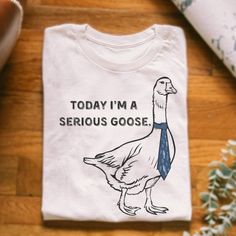 Today I_m A Serious Goose Tshirt, What_s Up Brother Shirt Discover The Latest Additions To Our Lineup: The Gildan 5000 T-Shirts, Where Style Seamlessly Meets Unparalleled Comfort! Designed To Cater To A Wide Range Of Preferences, These Shirts Are Available In Sizes Ranging From S To 3xl, Ensuring A Perfect Fit For Everyone. With A Vibrant Array Of Colors To Choose From, You Can Express Yourself However You Like. Crafted With Durability In Mind, These Shirts Maintain Their Shape And Color, Even A Funky Shirts, Fun Shirts, Brother Shirts, Funny T Shirts, Limassol, White Sand, Satire, Funny T, Cute Shirts