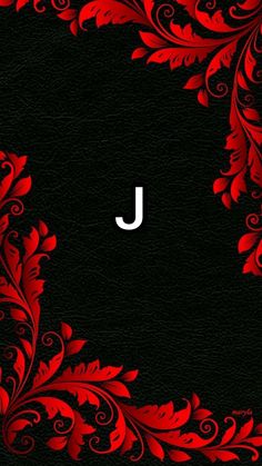 the letter j is surrounded by red leaves