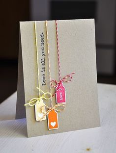 a card with two tags attached to it