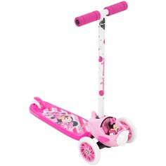 a pink scooter with minnie mouse on it