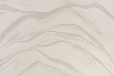 a white marble textured wallpaper with wavy lines in the center and diagonals at the edges