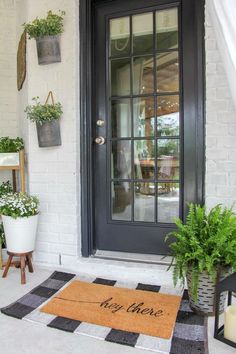 a welcome mat on the front door of a house