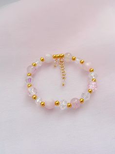 Add a touch of elegance and charm to your style with the Pink & Gold Beaded Bracelet - Dainty Coquette. This delicate, handmade bracelet features a beautiful combination of soft pink and gold beads, creating a feminine and sophisticated accessory that's perfect for any occasion. Whether you're dressing up for a special event or adding a subtle touch of glamour to your everyday look, this bracelet is the ideal choice. Crafted with attention to detail, the Pink & Gold Beaded Bracelet is lightweigh Dainty Coquette, Gold Beaded Bracelet, Rosa Gold, Bracelet Dainty, Handmade Gifts For Her, Gold Bead Bracelets, Stylish Gifts, Charm Bracelets, Gold Beads