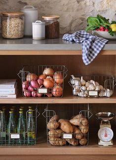 the shelves in this kitchen are filled with vegetables and fruits, along with other food items