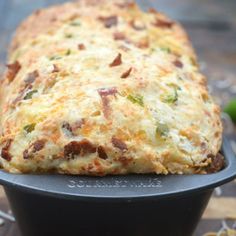 a casserole dish with meat and vegetables in it