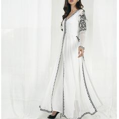 ✨Pakistani designer long white kameez paired with white straight silk pant, the kameez has beautiful resham thread embroidery. Superb elegant outfit for formal occasions. ✨This dress can be customise in any other colour and in all size, please contact us regarding any changes if you want.We will make this dress as per your choice. ✨Please note that this outfit is not a replica of low quality.This are all designers inspired customise outfit. ✨We use high quality fabric and threads for embroidery. White Dress For Wedding, White Kameez, Plus Size Wedding Gown, Wedding Dress Floral, Long Wedding Dress, Off White Pants, Chiffon Pants, Silk Pant, Floor Length Wedding Dress