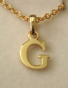 100% AUSTRALIAN MADE BRAND NEW GENUINE SOLID 9CT YELLOW GOLD BEAUTIFULLY CRAFTED INITIAL G LETTER CHARM PENDANT (with yellow gold bail) Other initials/letters also listed (chain is for display, not included  chain sold separately ) GENUINE SOLID YELLOW GOLD   NOT FILLED   NOT HOLLOW   NOT PLATED HALLMARKED (Stamped) 9ct Item measurements - Length : 10 mm (length is not including jump ring)  Width : 8 mm Weight : 0.65 grams approx. Our QUALITY is GUARANTEED. Buy with confidence. If you are not sa Initial G, G Letter, Letter Charm, Letter G, Initial Jewelry, Letter Charms, Gold Letters, Initial Letters, Jump Rings