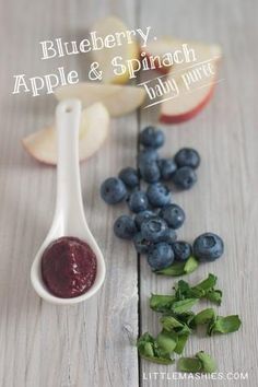 apples, blueberries and spinach puree on a wooden table with text overlay that reads apple, blueberry & spinach puree