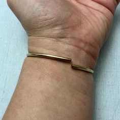 "Quantity: 1 Unit Dimensions: Length (Exterior) - 2.2\" (57mm) Length (Interior) - 2.1\" (53mm) Width - 0.8\" (20mm)" Elegant Bronze Bangle Bracelet, Elegant Nickel-free Gold Bracelets, Formal Gold Brass Bracelet, Gold Brass Bangle Bracelet For Formal Occasions, Formal Gold Brass Bracelets, Classic Gold Nickel-free Bracelet, Elegant Brass Bracelet With Polished Finish, Classic Gold Bracelet Nickel Free, Classic Adjustable Gold Brass Bracelet