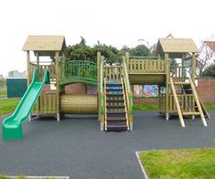 a children's play area with slide and climbing frame