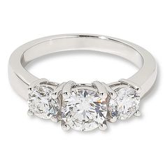 three stone diamond ring in white gold