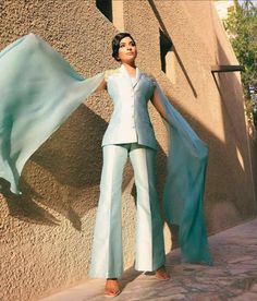 This stunning taffeta seafoam blue-green pant suit with 3D embroidery on shoulder and back. Cape sleeves are in pure flat chiffon to give a delicate feminine look. Cape Sleeves, Suits For Sale, Simple Pakistani Dresses, Green Pants, Custom Tailoring, Feminine Look, Pakistani Dresses, Asian Fashion, Custom Sizing