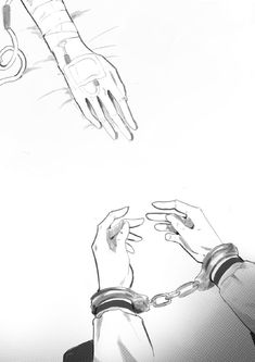 two hands are chained to each other by chains