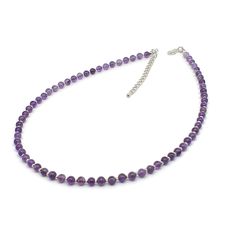 Handmade Natural Amethyst Beaded Collar Necklace Necklaces 1 and 3 are made with 4 mm round natural Amethyst beads interspaced with 2 mm galvanised silver glass beads adding contrast and sparkle The beads are strung on strong silicon-coated steel beading wire finished with silver-plated metal findings In addition to the round beads, necklace 2 incorporates 2x4 flat round natural Amethyst beads, adding texture and visual interest to the design Tibetan Silver flower spacer beads are used to separate and accentuate the gemstones Both designs are 16 inches long with an additional 2 inches (5 cm) extension chain that allows you to adjust the length to suit your neckline Both variations of the necklace offer a classic style that can complement a wide range of outfits, from dressing up for a spec Beaded Boho Necklace, Beaded Collar Necklace, Beaded Collar, Silver Glass, Beading Wire, Amethyst Beads, Glass Bead Necklace, Silver Flowers, Collar Necklace