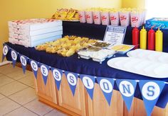 a buffet table filled with lots of food