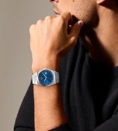 Blue Watch With Metal Rectangular Dial, Blue Automatic Watch With Rectangular Dial, Modern Blue Watch Accessories With Metal Dial, Blue Luxury Stainless Steel Watches, Luxury Blue Stainless Steel Watches, Modern Blue Watch With Metal Dial, Modern Blue Automatic Watch Accessories, Elegant Blue Chronograph Watch With Metal Dial, Elegant Blue Watch With Date Indicator