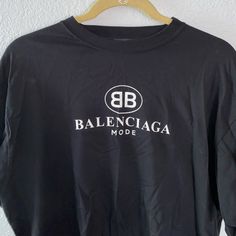 Balenciaga Mens T-Shirt . Color Black Runs Big, If You Shop This Brand You Know They Run Really Big. Brand New With Tag Size Small 100% Authentic Designer Crew Neck T-shirt With Letter Print, Designer Black Short Sleeve T-shirt, Designer Letter Print Crew Neck Top, Designer Crew Neck Top With Letter Print, Oversized Logo Print Crew Neck Shirt, Designer Crew Neck Shirt With Logo Print, Oversized Crew Neck Shirt With Logo Print, Designer Crew Neck Top With Logo Print, Designer Letter Print Tops For Streetwear