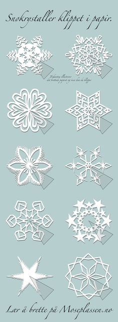 an image of snowflakes that are cut out and placed on top of each other