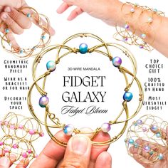 two hands holding rings and bracelets with the words fidgett galaxy