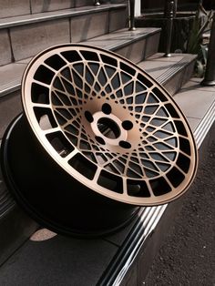 a black and gold rim on some steps