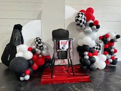 some balloons and chairs on a table